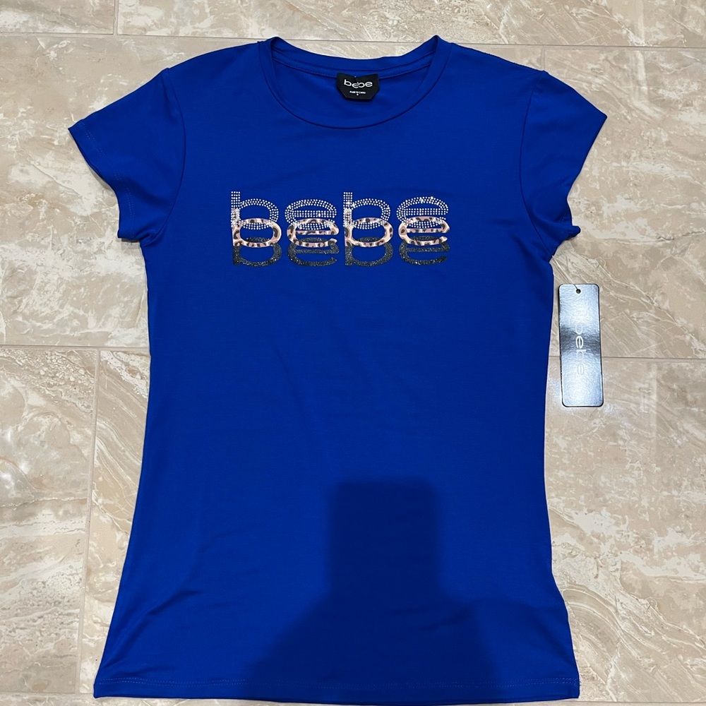 BEBE Women’s Top. New with tags.